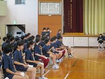進行係